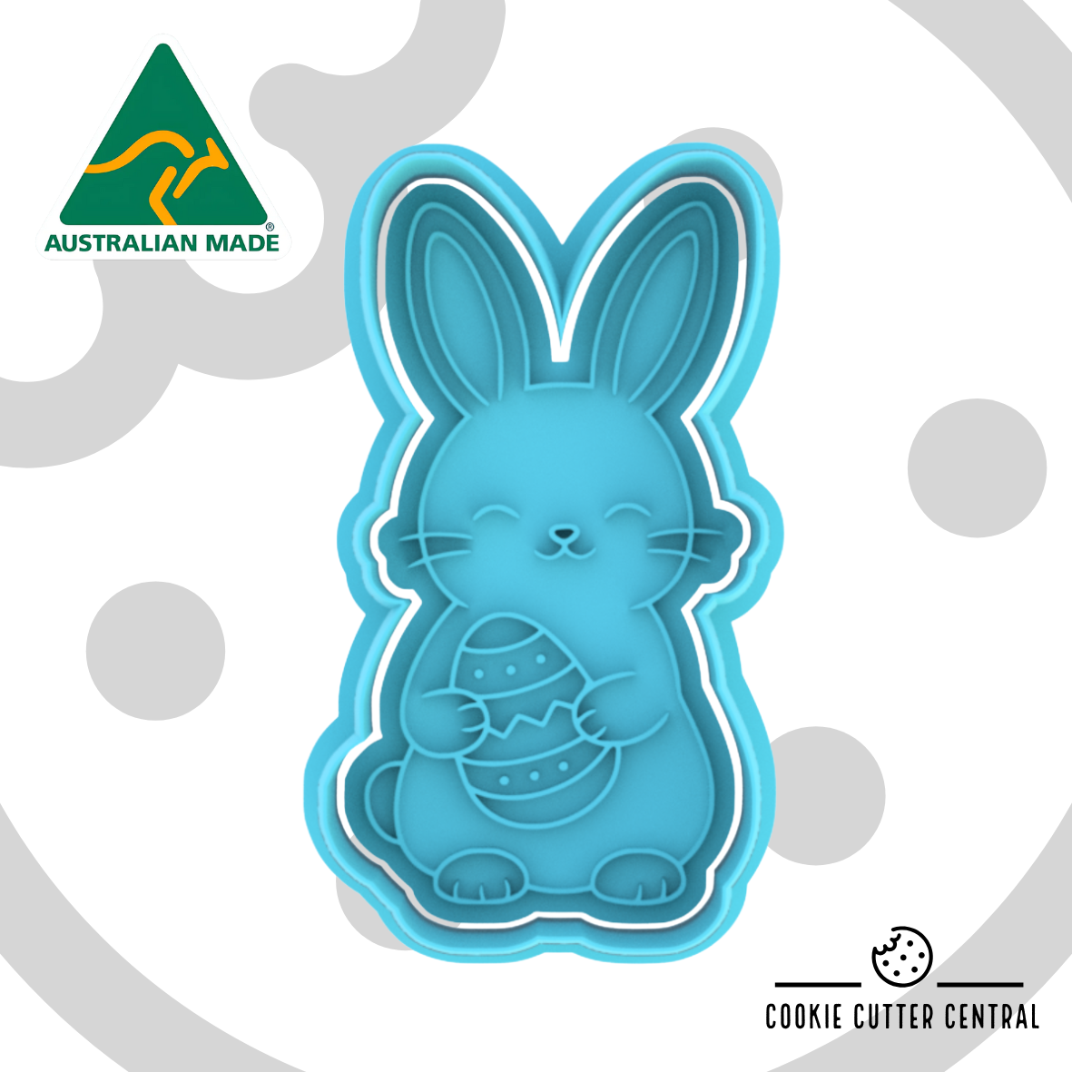 Bunny holding an Easter Egg Cookie Cutter and Embosser